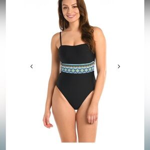 La blanca Running Wild Reversible Bandeau one piece swimsuit